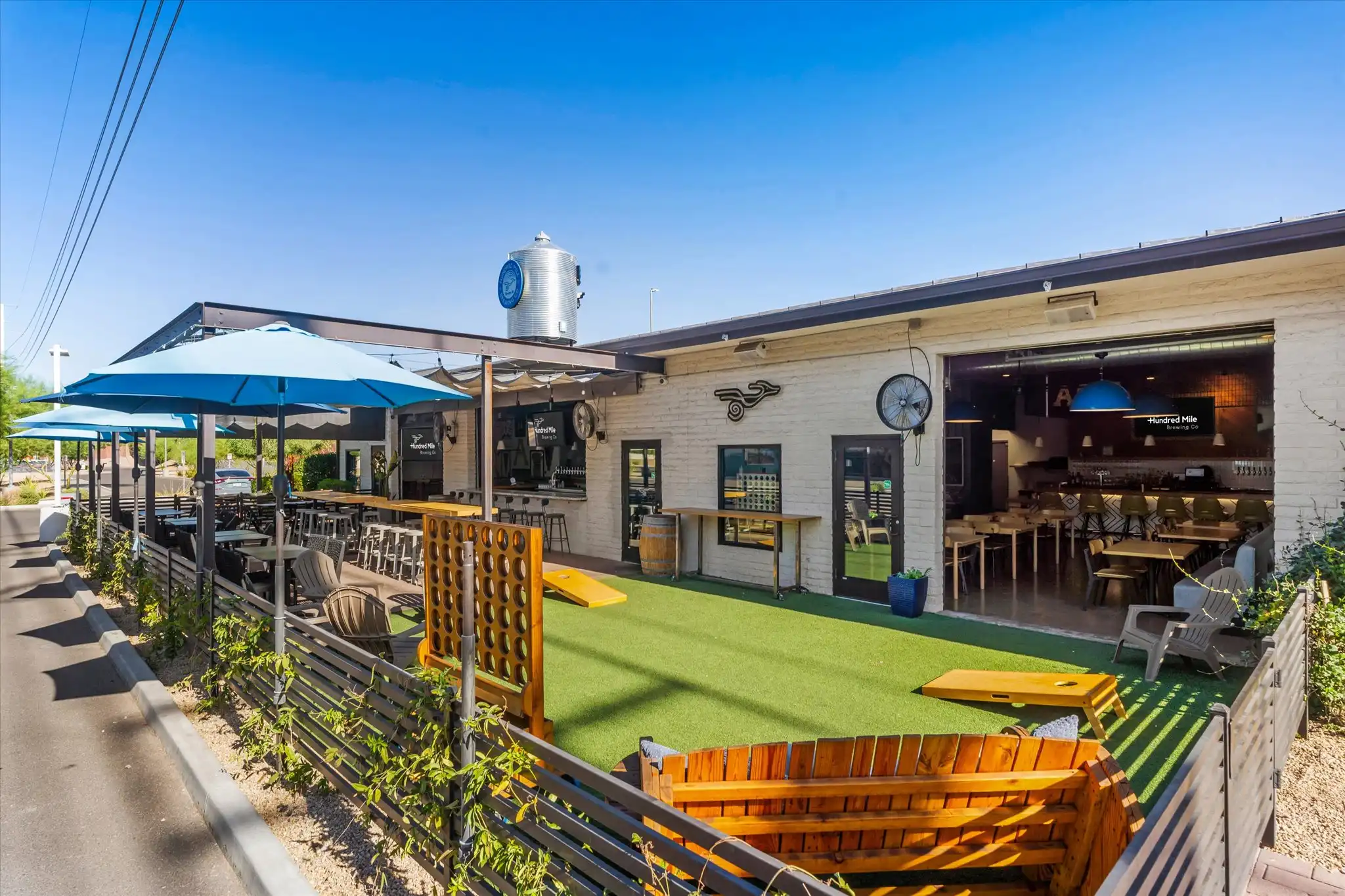 The lawn-game patio beside the brewery, with open space for outdoor games.