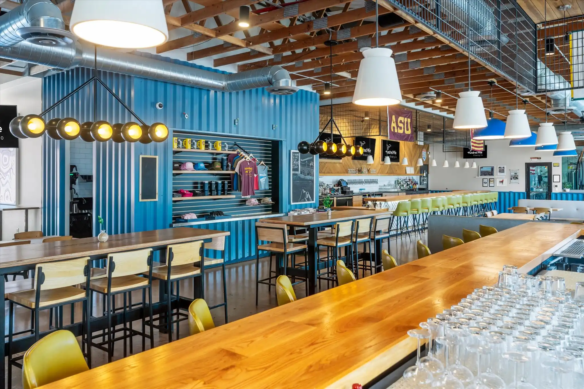 The main taproom bar at Hundred Mile Brewing.